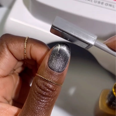 finger wearing DND DC Cat Eye Silver Lynx