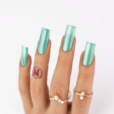 hands wearing M112 Dragon Slayer Matching Trio by Notpolish