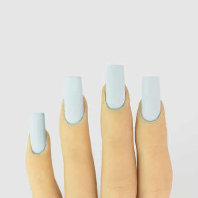 hands wearing OG107 Azure Trio by Notpolish