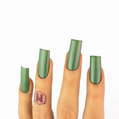 hands wearing OG124 Molasses Trio by Notpolish