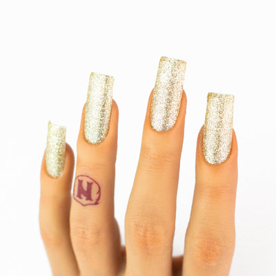 hands wearing OG134 The Nail Boss Trio by Notpolish