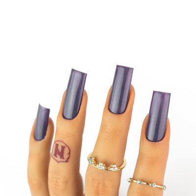 hands wearing OG156 Ultra Violet Trio by Notpolish