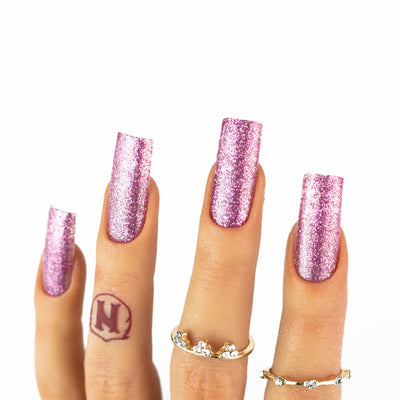 hands wearing OG175 Pink Stars Trio by Notpolish