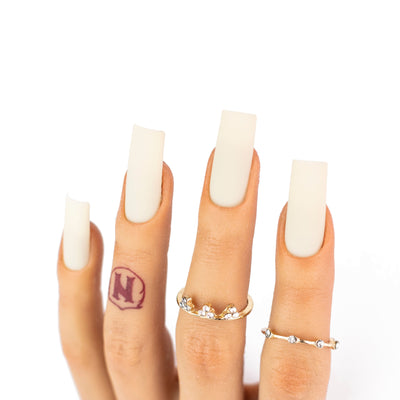 hands wearing OG216 Coconut Cream Trio by Notpolish