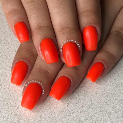 hands wearing 422 Portland Orange Gel Polish by DND