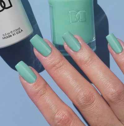 hands wearing 427 Air of Mint Gel Polish by DND