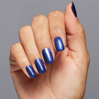 Hands wearing H021 Aquarius Renegade Gel Polish by OPI