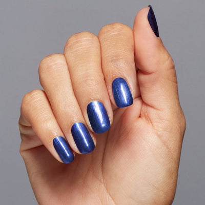 Hands wearing H021 Aquarius Renegade Lacquer by OPI