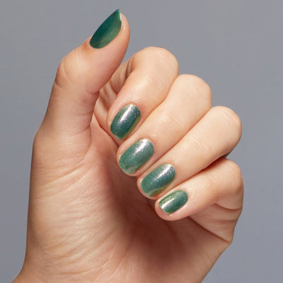 Hands wearing H016 Feelin' Capricorn-Y Lacquer by OPI