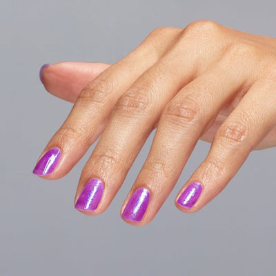 Hands wearing H020 Feelin' Libra-Ted Lacquer by OPI