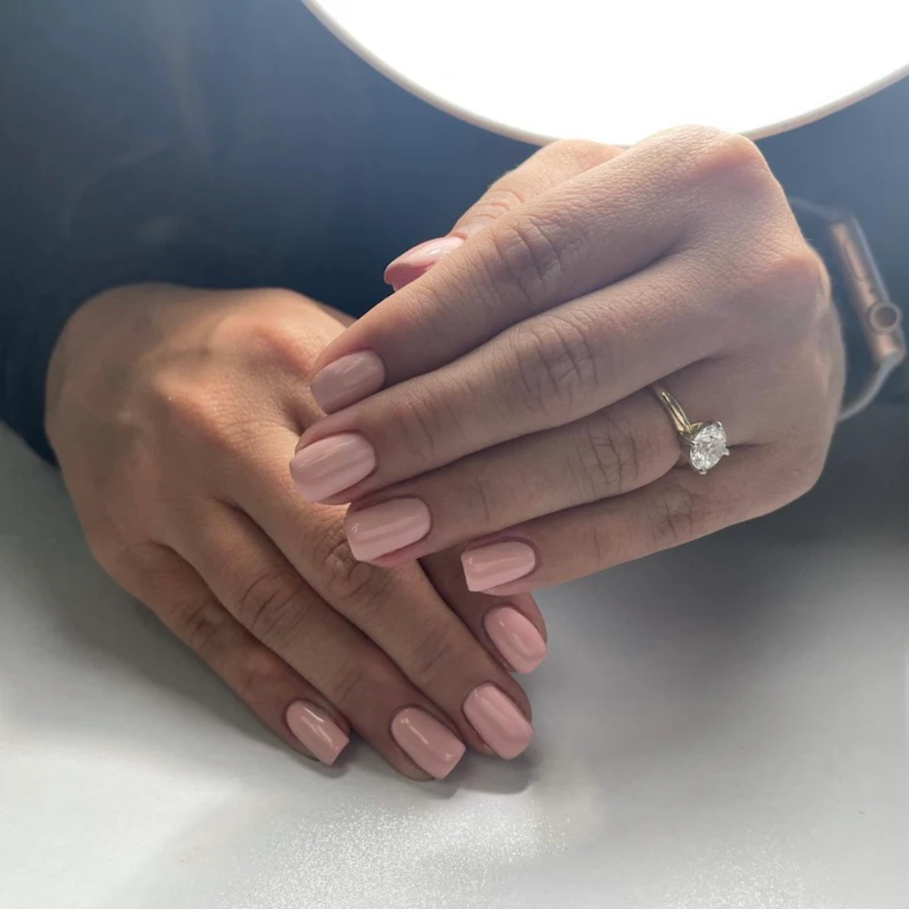 hands wearing DND DC Gel - 140 Khaki Rose