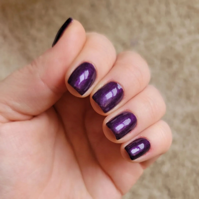 hands wearing DND Gel Polish 702 Astral Blast