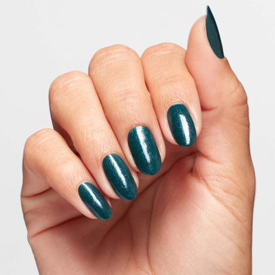 Hands wearing Q18 Let's Scrooge Infinite Shine by OPI