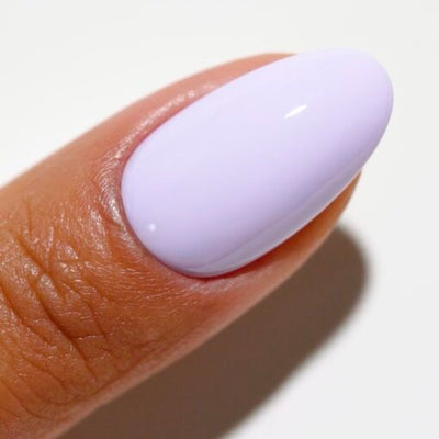 Finger wearing 2532 Lavender Haze Gel & Polish Duo by DND DC