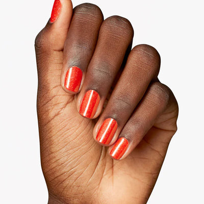 OPI Infinite Shine L202 Shock Em Orange hand