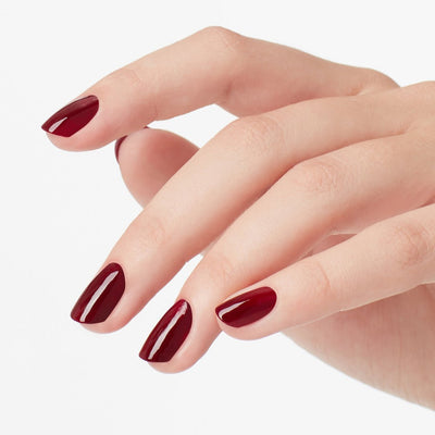 hands wearing W52 Got The Blues For Red Intelli-Gel Trio by OPI