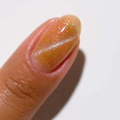 finger wearing DND DC 9D Cat Eye Gel 'Cosmic Astral'