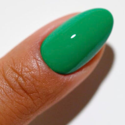 Finger wearing 2525 Zen Oasis Gel & Polish Duo by DND DC