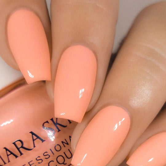 Hands wearing #404 Skin Tone Classic Gel & Polish Duo by Kiara Sky