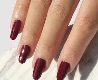 hands wearing 634 Reddish Purple Trio by DND