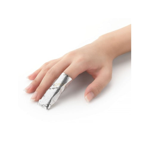 Hands Using Foil Wraps for Nail Remover
