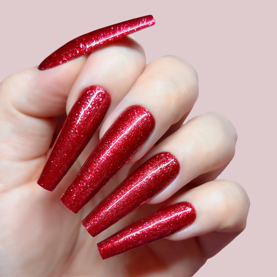 Hands wearing GFX203 Candy Apple Platinum FX Gel by Kiara Sky