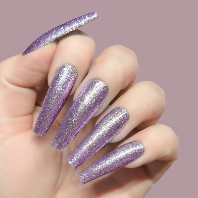 Hands wearing GFX205 Euphoria Platinum FX Gel by Kiara Sky