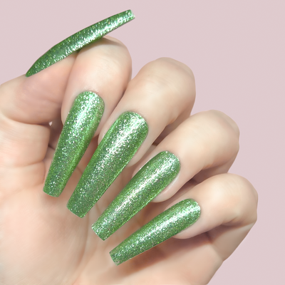 Hands wearing GFX208 Emerald Star Platinum FX Gel by Kiara Sky