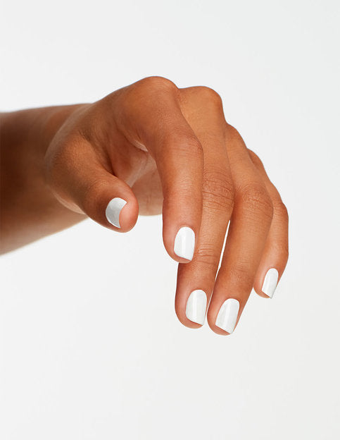 hands wearing L00 Alpine Snow Nail Lacquer by OPI