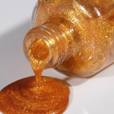 swatch of 481 Burst of Gold Gel & Polish Duo by DND