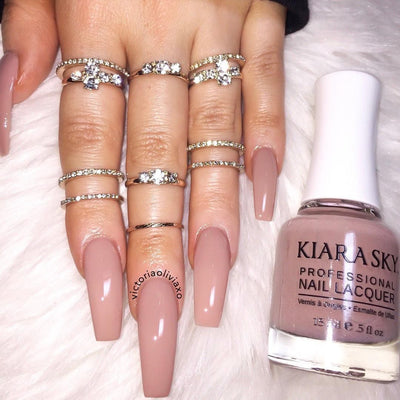 Hands wearing 605 Bare Skin Polish by Kiara Sky
