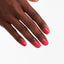 hands wearing B35 Charged Up Cherry Gel Polish by OPI