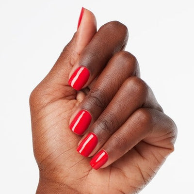 hands wearing C13 Coca Cola Trio by OPI