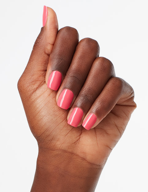 hands wearing I42 Elephantastic Pink Nail Lacquer by OPI