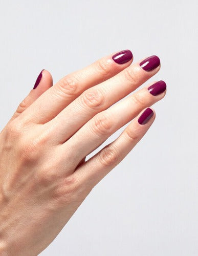 hands wearing P06 Feelin' Berry Glam Gel Polish by OPI