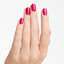 hands wearing B31 Flashbulb Fuchsia Gel Polish by OPI