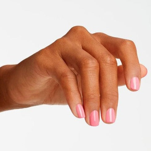 hands wearing A68 Kiss Me I'm Brazilian Trio by OPI