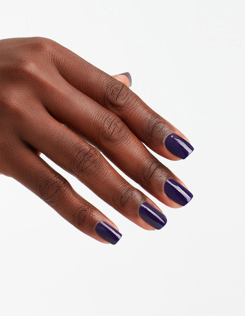 hands wearing E72 Opi.. Eurso Euro Nail Lacquer by OPI