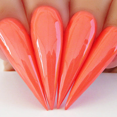 hands wearing 490 Romantic Coral Dip Powder by Kiara Sky