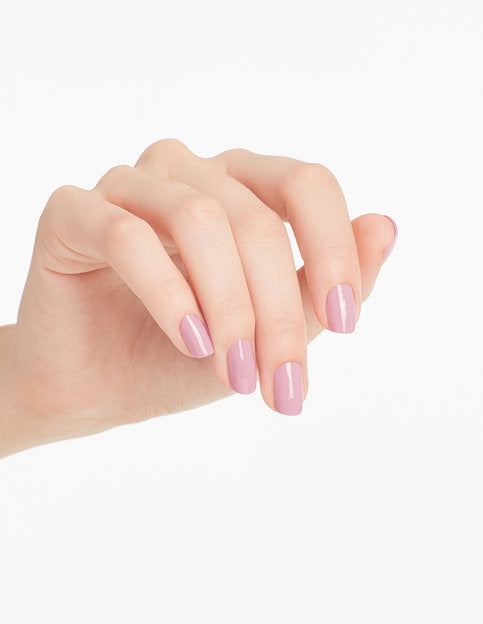 hands wearing P32 SEVEN WONDERS OF OPI Nail Lacquer by OPI