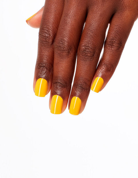 hands wearing L23 Sun, Sea, and Sand in My Pants Gel & Polish Duo by OPI