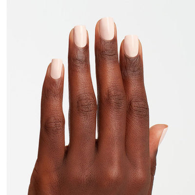 hands wearing T74 Stop It I'm Blushing Dip Powder 1.5oz by OPI