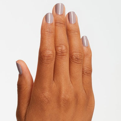 hands wearing A61 Taupe-less Beach Dip Powder by OPI