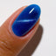finger wearing DND DC Cat Eye Galactic Sapphire
