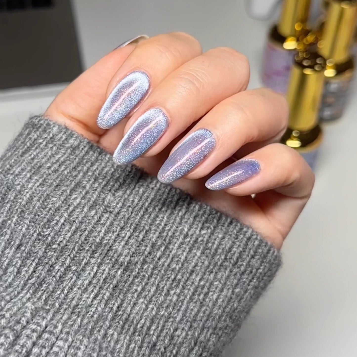 hands wearing DND DC Cat Eye Celestial Prism