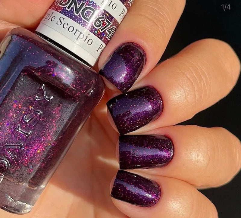 hands wearing DND Duo gel polish 674 Purple Scorpio