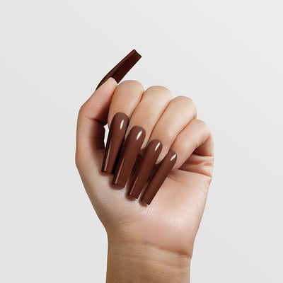 hands wearing 139 Dark Chocolate Acrylic Powder by Chaun Legend