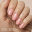 Model wearing Aprés Soft Gel Builder Gel Blush, featuring rosy pink clean girl nails with a glossy structured gel manicure.
