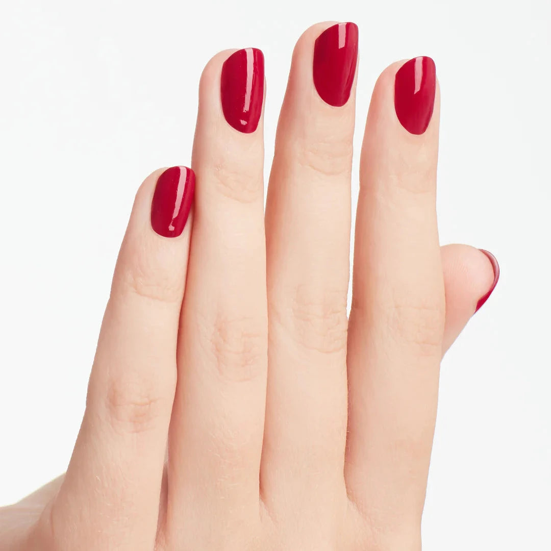 hands wearing B78 Miami Beet Intelli-Gel Duo by OPI