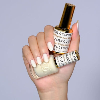 hands wearing 2438 Whipped Cream Gel & Polish Duo by DND DC